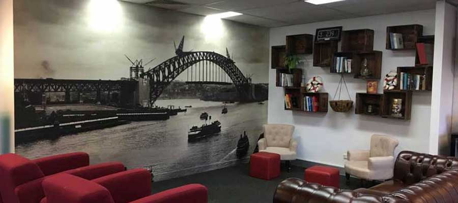 Self-installed by the staff, custom printed wallpaper mural on PhotoTex